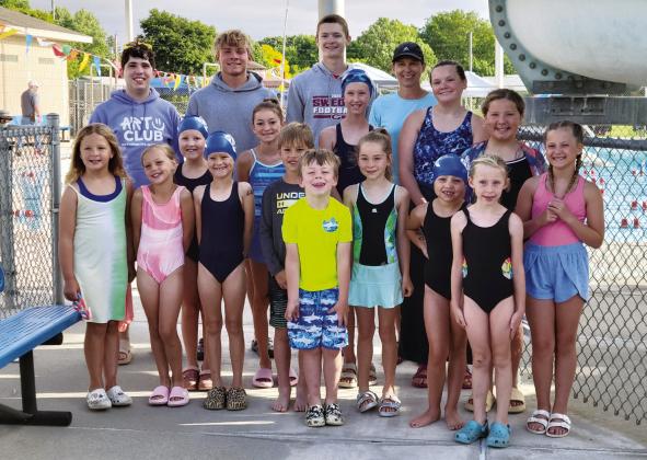 Members of the 2026 Gothenburg swim team are, front row, from left: Maeli Blecha, Haven Wolf, Paetyn Meyer, Boden Wolf, Braylen Jorgenson, Ella Madsen, Brecklynn Brown, Adalynn Jorgenson, and Harper Bogus; middle row: Adelyn Meyer, Sophie Madsen, Emersyn Meyer, Layla Hagin, and Charli Blecha; back row: Brant Miller (assistant coach), Tyler Hetz, Logan Feather (assistant coach), and Lisa Jorgenson (head coach). Not pictured: Austin Madsen and Blake McNulty. (Leader photo by Ellen Mortensen)