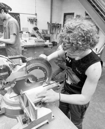 Projects like wooden plaques in woods class and making sushi in FCS show what CTE is all about at BPS — learning by doing, creating something meaningful, and developing skills that transfer to careers and everyday life. (Photos courtesy BPS)