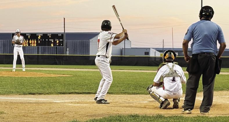 Gothenburg pitcher William McVay faces a Lexington batter on Friday, June 12, with Evan Geiser at catcher. The Junior Melons were able to keep their win streak alive by beating Lexington 7-6. (Photo courtesy Kim Johnson)