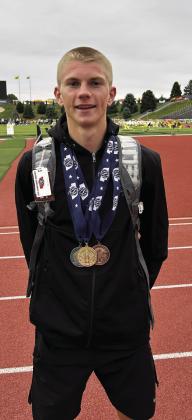 Bryson Neels came home from the 2026 state track meet with three medals - including a state championship - and a new school record. (Photo courtesy Donna Wiedeburg)