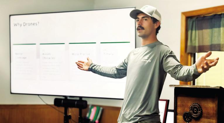 Jake Burge explains his drone flying business, Evolution Ag, to an attentive group of Rotarians at a recent Gothenburg Rotary Club meeting. (Photos courtesy Gothenburg Rotary)