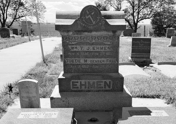 ABOVE: Gothenburg’s downtown park pays homage to one of the community’s founders, Rev. William Ehmen. LEFT: Rev. William Ehmen settled in Gothenburg in 1879, six years before the town was officially incorporated. He and his wife are buried in the Lutheran cemetery northeast of town.