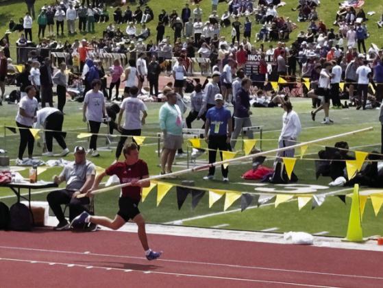 Teague Butterfield makes his approach to the pole vault, where he earned the eighth place medal. (Photo courtesy Kim Johnson)