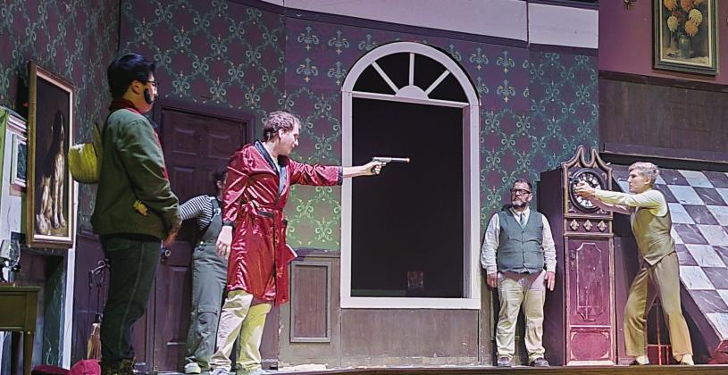 From left: Ryan Johnson as Max Bennett playing Cecil Haversham; Michael May as Jonathan Harris playing Charles Haversham; Erin Beavers (behind May); Jesse Kincheloe (Thomas Colleymoore); and Carter Kincheloe (Inspector Carter).