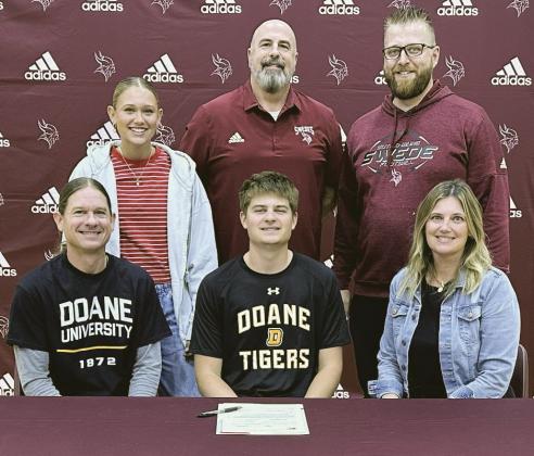 Gothenburg High School senior Boone Tederman was joined by family members, coaches, and teammates on Tuesday, May 5, as he signed a letter of intent to play basketball at Doane University next season. Pictured seated, from left, are Mark Tederman, Boone Tederman, and Lindsey Stevens; Back row: Bodey Tederman, Coach Kent Koehn, and Seth Schaeffer. (Photo courtesy GPS)
