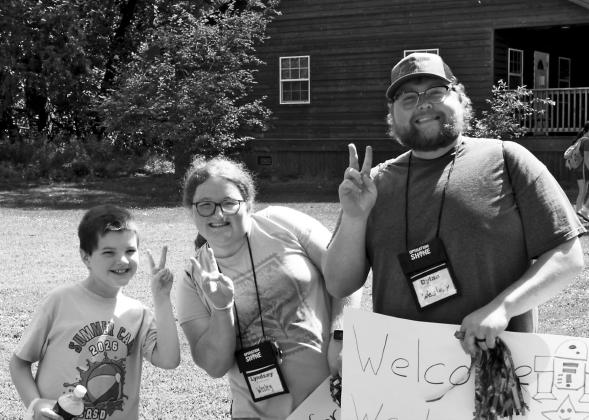Lyndsay Anderson (center), a 2025 Gothenburg High School graduate, recently completed her fifth year of volunteering at Operation Shine Camp, working with children with developmental disabilities. She says it is a highlight of her summer. (Photo courtesy Jenny Daup)