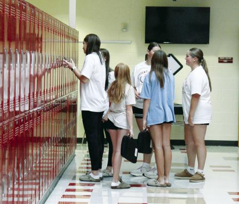 During the school open house on Monday evening, students were given their locker assignments and members of the Student Council were on hand to assist.