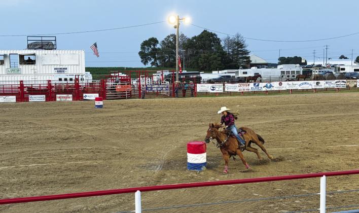Gracee Downing of Stapleton takes her turn at barrel racing during the Pony Express Rodeo in Gothenburg on July 3. The rodeo has become an Independence Day tradition.
