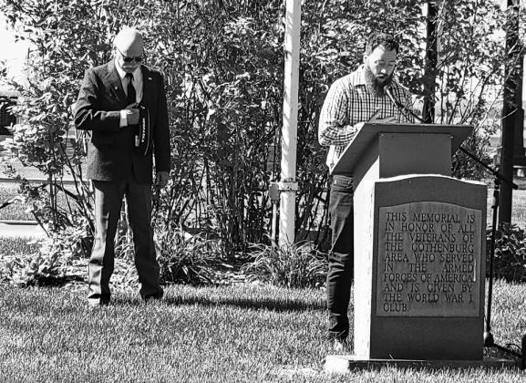 ABOVE: Pastor Jonathan Phillips gave the convocation, led the Pledge of Allegiance, and sang The Star Spangled Banner to open the May 25 Memorial Day program at the Gothenburg Cemetery. LEFT: Vietnam veteran Richard Colson was the guest speaker for this year’s program. (Leader photos by Ellen Mortensen)