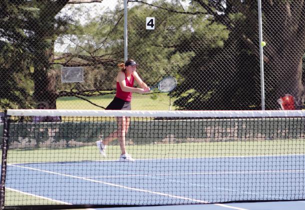 GHS senior, now graduate, Lindly Anderson receives a serve during a match at the state tennis tournament in Lincoln last week. (Leader photo by Megan Aden)