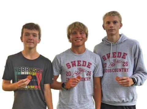 Medaling for the GHS men’s team at the Ogallala cross country invite last week were, from left: Blake Finke - 8th, Tyler Hetz - 3rd, and Bryson Neels 2nd. (Photos courtesy GPS)