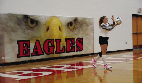 Freshman Tailynn Stearns prepares to serve during the Eagles’ home match against Wauneta-Palisade on Sept. 4. (Photo courtesy Brady Public Schools)