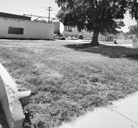 A parcel of land located at Avenue D and 10th Street is being donated to the City of Gothenburg by Flatwater Bank for the creation of a downtown city park. (Leader photo by Ellen Mortensen)