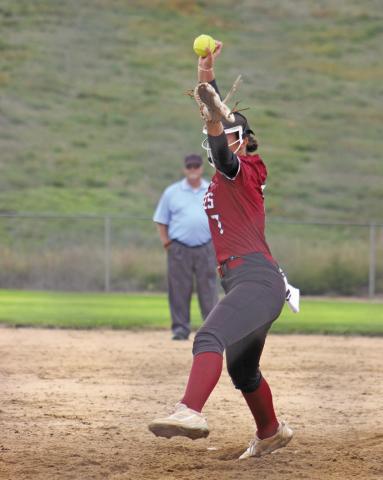 Taye Herrick strides out for a pitch against Chadron during a tournament in Ogallala on Sept. 24. (Leader photos by Megan Aden)