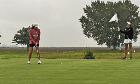 Lily Sics squares up for a putt during the SWC meet in Cozad on Sept. 28. She shot the best round of her career at the meet, earning the 12th-place medal. (Photos courtesy Tara Foster)
