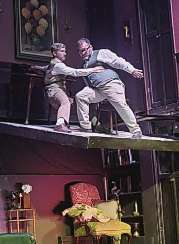 While it may look as though this is a stage malfunction, which it was in the play being portrayed, actors Carter Kincheloe and Jesse Kincheloe were perfectly safe in this scene...well, almost.