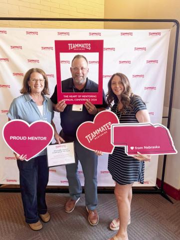 Representing the Gothenburg TeamMates program at the annual conference and accepting the Regional Chapter of the Year award were, from left: board members Angie Nichols and Luke Rickertsen, and GPS Guidance Counselor Shauna Baker. (Courtesy photo)
