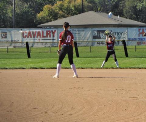 Briony Aden makes a catch in shallow center field to secure an out for the Swedes. Aden recorded 3 of the 8 outs the Swedes accumulated in the game.