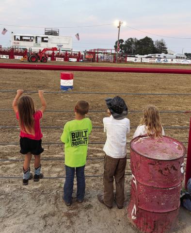 The rodeo is exciting to watch for spectators of all ages. These kids got as close to the action last Friday night as they could!