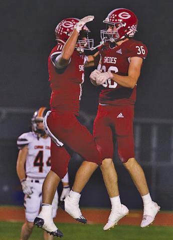 Axtyn Jesseph (#36) and Braden Ehlers (#11) celebrate after one of Jesseph’s 4 touchdown receptions on the night, setting a new school record.