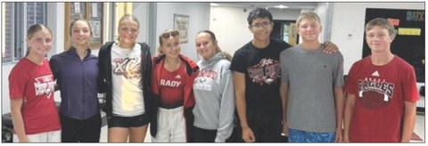 Members of the Brady cross country team gather before heading to the Cozad Invite on Sept. 3. The Eagles turned in a strong day on the course, highlighted by several medal finishes and new personal records. (Photo courtesy Brady Public Schools)