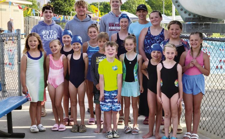 Members of the 2026 Gothenburg swim team are, front row, from left: Maeli Blecha, Haven Wolf, Paetyn Meyer, Boden Wolf, Braylen Jorgenson, Ella Madsen, Brecklynn Brown, Adalynn Jorgenson, and Harper Bogus; middle row: Adelyn Meyer, Sophie Madsen, Emersyn Meyer, Layla Hagin, and Charli Blecha; back row: Brant Miller (assistant coach), Tyler Hetz, Logan Feather (assistant coach), and Lisa Jorgenson (head coach). Not pictured: Austin Madsen and Blake McNulty. (Leader photo by Ellen Mortensen)