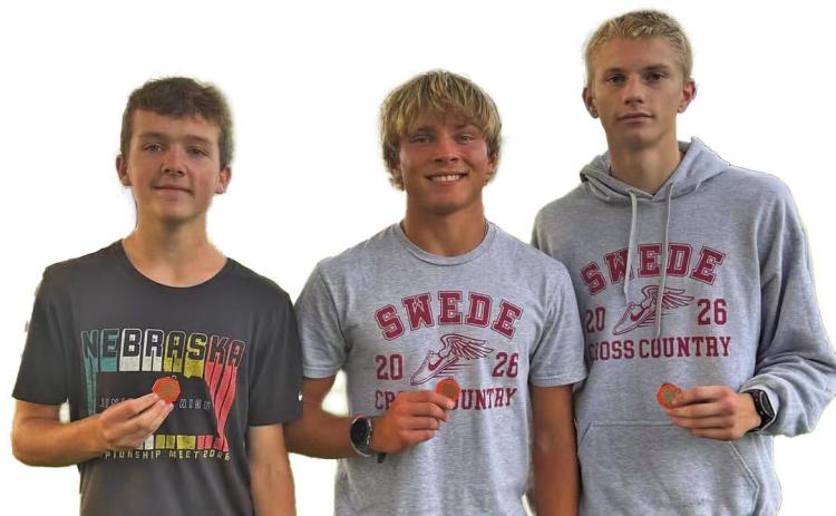 Medaling for the GHS men’s team at the Ogallala cross country invite last week were, from left: Blake Finke - 8th, Tyler Hetz - 3rd, and Bryson Neels 2nd. (Photos courtesy GPS)