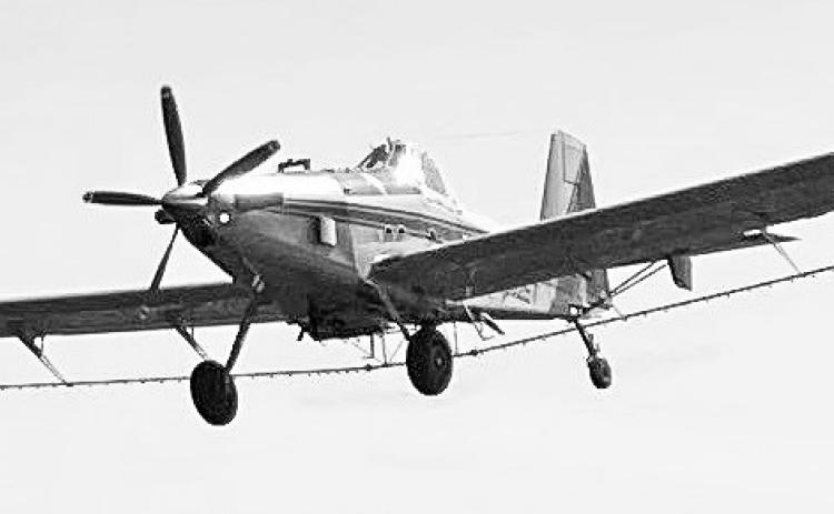 The familiar yellow spray planes of Mid State Aviation in Cozad are coming under new ownership, as the business has recently been acquired by Nebraskaland Aviation. (Photo courtesy Allison Johnson)