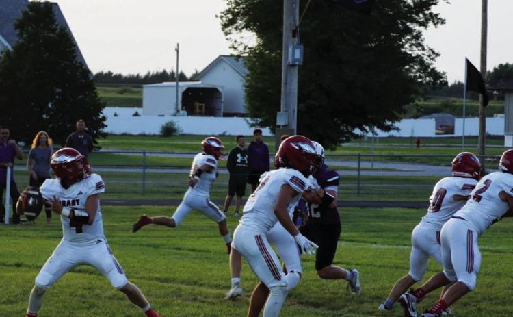 Brady quarterback Cinch Sanger looks downfield for an open receiver during the Eagles’ 62-0 win over Axtell on Aug. 28. Brady moved to 2-0 with the victory after opening the season with a 57-0 win over Sutherland. (Photo courtesy Brady Public School)