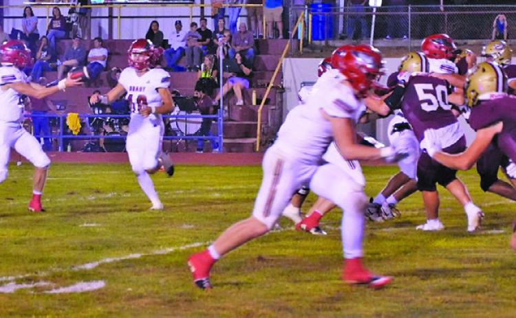 Brady quarterback Cinch Sanger hands the ball off during the Eagles’ Sept. 18 matchup with Dundy County-Stratton. The Eagles rushed for 290 yards on their way to a 62-14 victory.