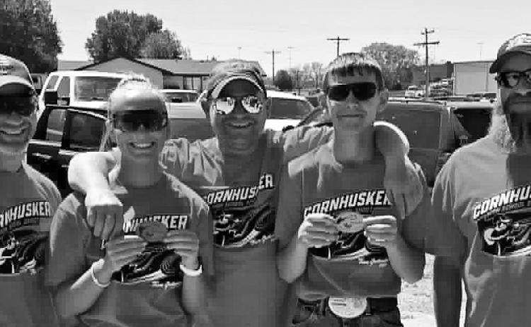 Gothenburg Trap’s top seniors, Dakota Warner and Lane Hinrichsen, both earned a 25-straight patch in their rounds at the Cornhusker Trapshoot last week, wrapping up their season on a high note. L-R: Coach Caleb Warner, Dakota Warner, Coach Adam Warner, Lane Hinrichsen, Coach Wade Viter. (Photos courtesy of Gothenburg Trap)