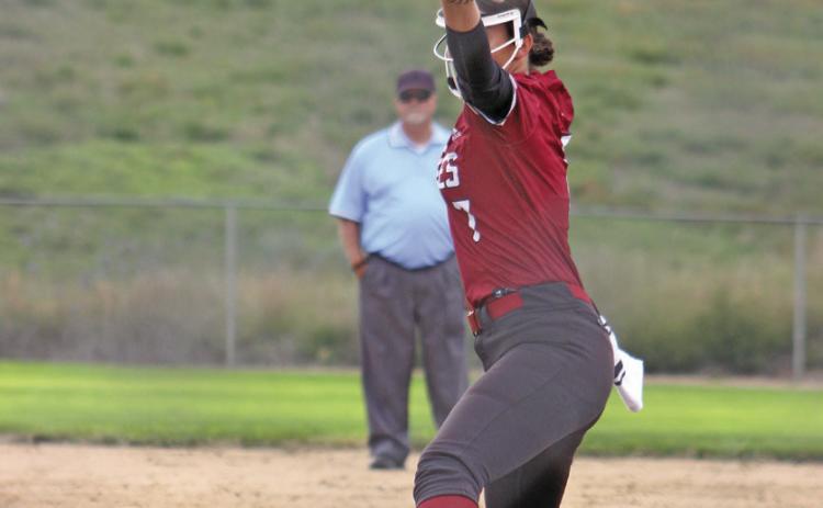 Taye Herrick strides out for a pitch against Chadron during a tournament in Ogallala on Sept. 24. (Leader photos by Megan Aden)