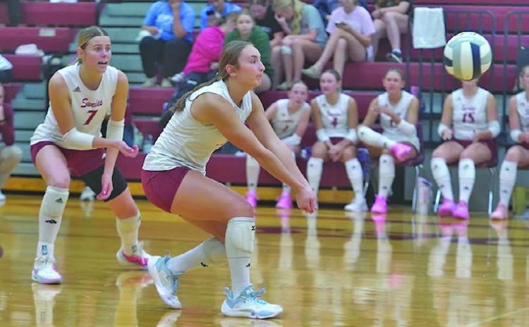 Ellaray Koch focuses on digging the ball for the Lady Swedes. Last week Koch had 13 digs and 5 kills against Ogallala, and 13 kills against McCook. (Leader photos by Charity Wyatt)
