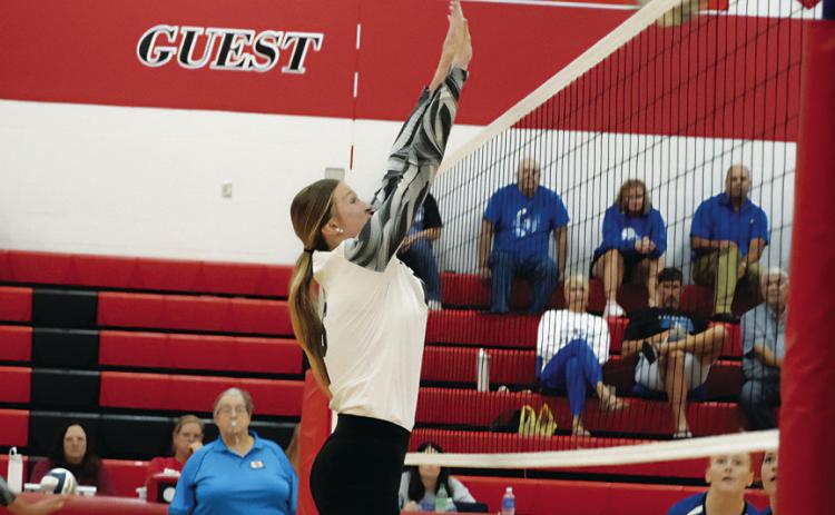 Ava Foster goes up for a block during the Eagles’ Sept. 10 home match against Arapahoe. Brady took the third set before falling to the Warriors 3-1.