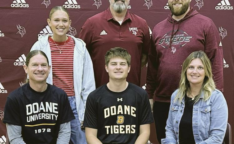 Gothenburg High School senior Boone Tederman was joined by family members, coaches, and teammates on Tuesday, May 5, as he signed a letter of intent to play basketball at Doane University next season. Pictured seated, from left, are Mark Tederman, Boone Tederman, and Lindsey Stevens; Back row: Bodey Tederman, Coach Kent Koehn, and Seth Schaeffer. (Photo courtesy GPS)