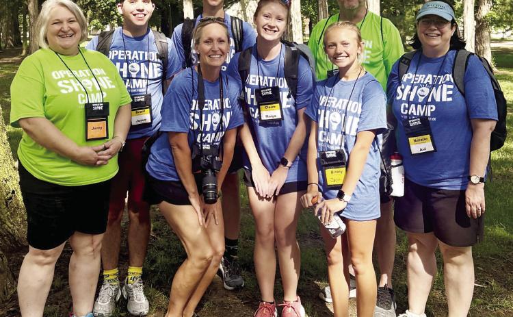Operation Shine Camp is a unique summer camp geared for children with autism and Down Syndrome. This year, several volunteers from Gothenburg helped at the camp near Hordville. Pictured front row, from left, are: Jenny Daup, Shiloh Schultz, Claire Vincent, Briony Aden, and Natalie Waskowiak (who now lives in Kearney); back row: Brant Miller, Carter Vincent, and Alan Daup. Also volunteering but not pictured were Lyndsay Anderson and Seth Daup. (Photo courtesy Jenny Daup)