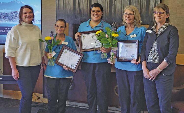 Three Stone Hearth Estates staff members were recognized on Oct. 8 for recently completing specialized dementia care training. From left are Administrator Ashley Johnson, Miranda Smyth, Alexis Ruano, Jennie Rodriguez, and Barb Nuxoll. (Leader photo by Ellen Mortensen)