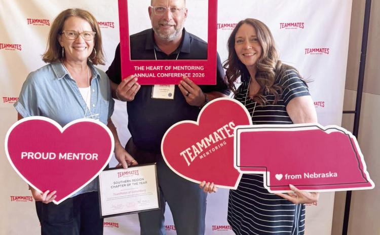 Representing the Gothenburg TeamMates program at the annual conference and accepting the Regional Chapter of the Year award were, from left: board members Angie Nichols and Luke Rickertsen, and GPS Guidance Counselor Shauna Baker. (Courtesy photo)