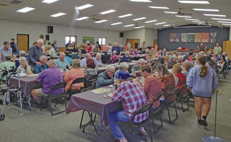 A large crowd gathered at Our Lady of Good Counsel Catholic Church in Gothenburg on Sunday, Oct. 4, for the annual fall turkey dinner. Between dining in and take-out, more than 600 meals were served by a large host of volunteers. (Leader photo by Ellen Mortensen)
