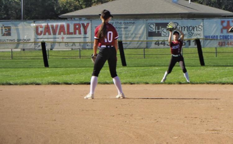 Briony Aden makes a catch in shallow center field to secure an out for the Swedes. Aden recorded 3 of the 8 outs the Swedes accumulated in the game.