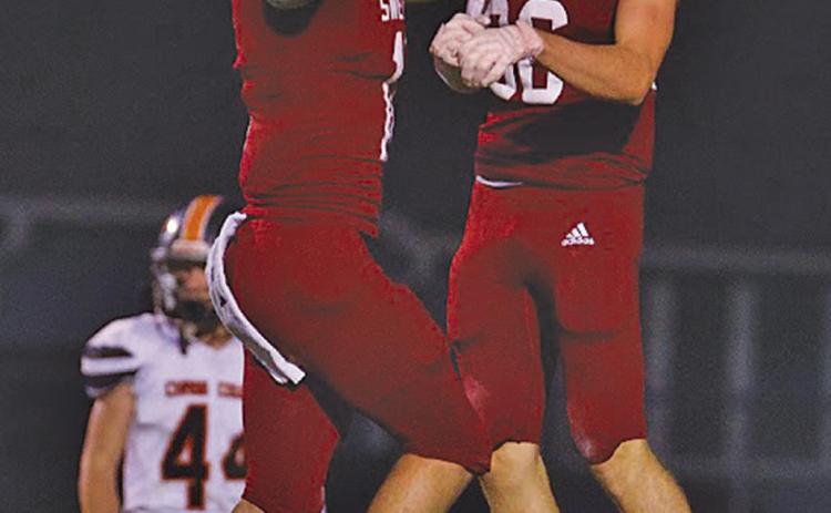 Axtyn Jesseph (#36) and Braden Ehlers (#11) celebrate after one of Jesseph’s 4 touchdown receptions on the night, setting a new school record.