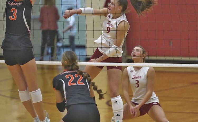 Senior Shayne Kinnan (#9) came off the bench for the Swedes to get 3 kills against Chase County last week.