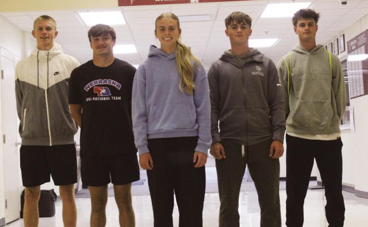 A number of school track and field records fell this year at GHS. New records were set by, from left: Bryson Neels – 400m, 800m, 4x400m relay; Maddox Gilligan – 4x400m relay; Lily Fritton – tied record in high jump; Callen Johnson – 4x400 relay; Evan Johnson – 4x400 relay. (Leader photo by Ellen Mortensen)